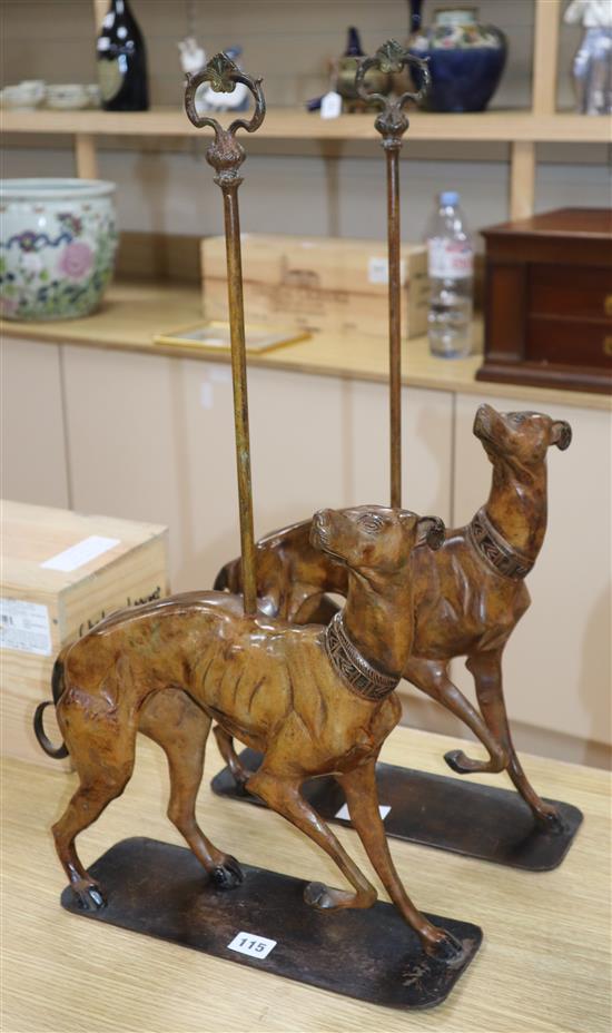 A pair of bronzed metal door stops in the form of hounds height 64.5cm